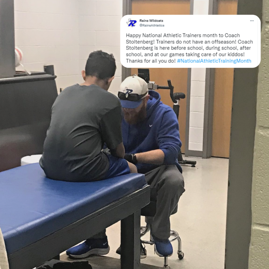 trainer working on a student's leg in the athletic training office